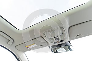 ceiling of the car with a transparent glass hatch for airing.