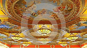 Ceiling chandeliers and paintings of venetian hotel, macau photo