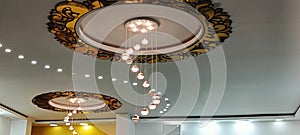 ceiling decorated with lights and distinctive geometry photo