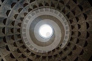 Ceiling and the dome inside the Pantheon roman temple and catholic church in rome Italy.