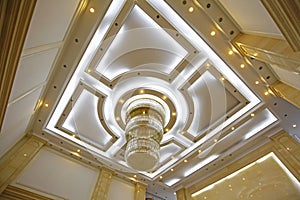 On the ceiling droplight on the ceiling droplight in hotel features photo