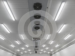 Ceiling of factory interrior with boxes of an industrial refrigerator photo