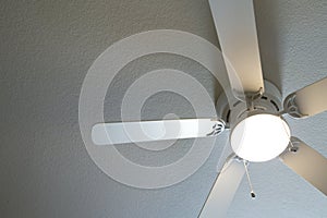 Ceiling fan light is on photo