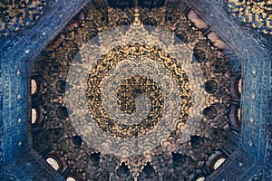 Ceiling with intricate sculpted details of moorish arabian origins