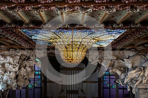 Ceiling with inverted dome stained-glass skylight. Palau de la Musica Catalana by Domenech i Montaner. Barcelona, Catalonia.