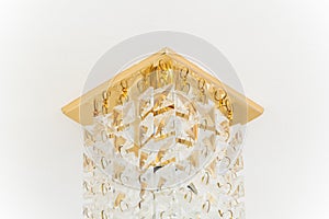 Ceiling lamp with gold base and hanging crystal cubes