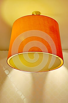 Ceiling Lamp with Orange Lampshade photo
