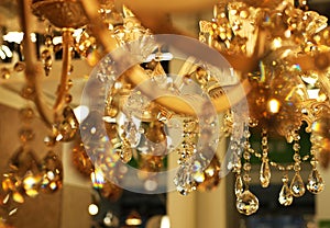 Ceiling lamps, chandeliers in the store, shopping concept