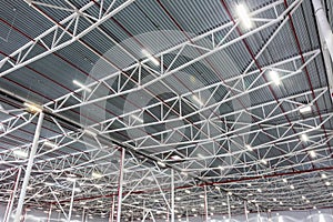 Ceiling lamps with diode lighting in a modern warehouse