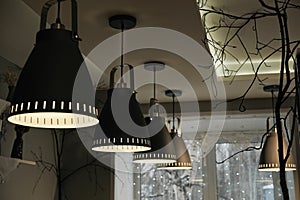 ceiling light lamps in evening cafe, night moody aesthetic, pendant lights, nordic style, simple design.