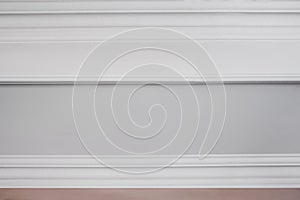Ceiling moldings on a white surface. Details of the ceiling