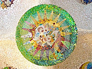 Ceiling with mosaic sun of Park Guell photo