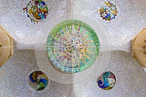 Ceiling with mosaic sun roof tile at Guell Park, Barcelona, Spain.