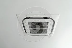 Ceiling mounted cassette type air conditioner in the modern building