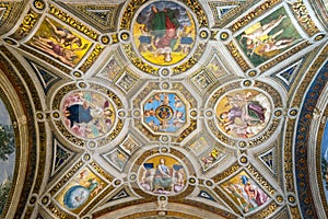 The ceiling in one of the rooms of Raphael in the Vatican Museum