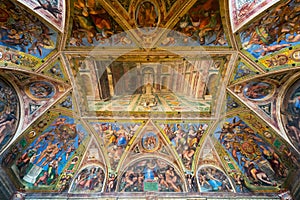 The ceiling in one of the rooms of Raphael in the Vatican Museum