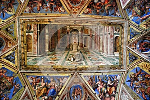 The ceiling in one of the rooms of Raphael in the Vatican Museum