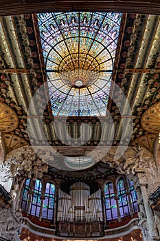 Ceiling and pipe organ of Palau de la Musica Catalana, Concert Hall by Lluis Domenech i Montaner. Barcelona, Catalonia.