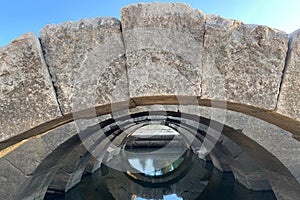 Ceiling ruins of ancient stone temple of Apollon in Klaros ancient city filled water photo