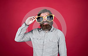 celebrate the anniversary. party goer. hipster man with beard and moustache wearing glasses. concept of holiday. have a