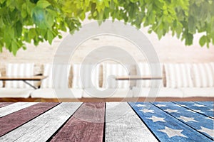 Celebrate independence day usa flag on table top in the park for background