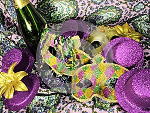 Celebrate Mardi gras, masks, beads, wine, purple gold green