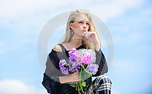 Celebrate spring. Girl fashion model carry hydrangea flowers. Spring fresh bouquet. Gardening and botany concept