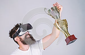 Celebrate victory. Feel victory in virtual reality games. Achieve victory. Hipster virtual gamer got achievement. Man