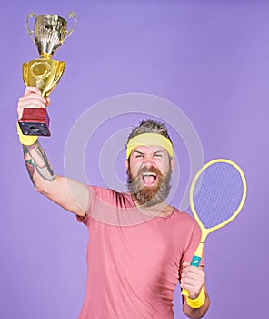 Celebrate victory. Tennis champion. Athletic man hold tennis racket and golden goblet. Win tennis game. Tennis player