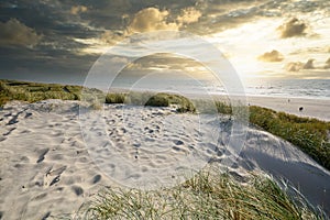 Celebrating Christmas and New years eve at North sea coast, view to beautiful landscape with deserted and calm beach and sand