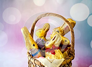 Celebrating easter with, gold foiled chocolate bunnies and colorful eggs