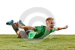 Celebrating goal. Excited football player shouting, expressing win emotions isolated over white background. Sport, win