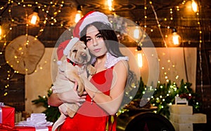 Celebrating New Year together. sensual girl in erotic lingerie. girl with cute puppy dog. happy new year. dog year