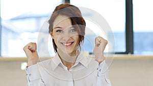 Celebrating Success in Office, Excited Woman photo