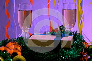 The celebration of Christmas and the New year with champagne. Christmas holiday decorated table.