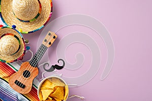 Celebration of Cinco de Mayo. Top view showcasing traditional symbols: hats, vihuela photo