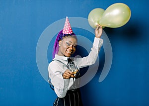 Celebration Concept, Birthday Party - Close up Portrait happy young beautiful african woman in black pants and white