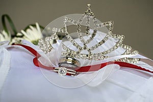 A celebration with a crown and rings