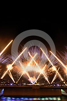 Celebration fireworks at Phra Phuttha Yodfa memorial bridge Cho Phraya river in Thailand