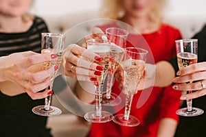 Celebration. Hands holding the glasses of champagne and wine making a toast. The party, wedding, celebration, alcohol, lifestyle,