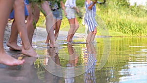 Celebration of Ivan Kupala. Girls and women lay wreaths on the water. Folk tradition