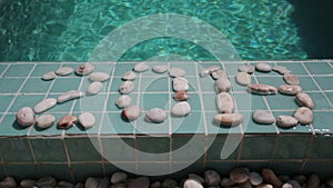 Celebration of new year,Date 2019 is laid out by pebble stones on the edge of the pool in the tropical resort