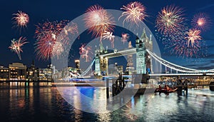 Celebration of the New Year in London at the Tower bridge with firework, UK