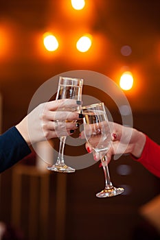 Celebration. People holding glasses of champagne making a toast