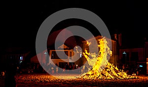 celebration in the village with a huge bonfire in the beach