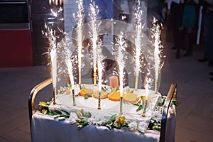 Celebratory cake with fireworks