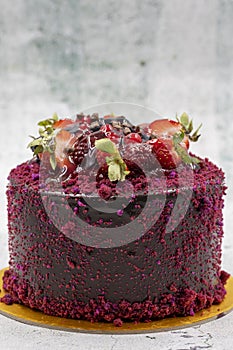Celebratory cake on a gray background. Close up