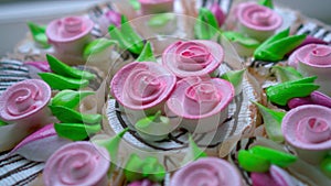 Celebratory cake with pink flowers