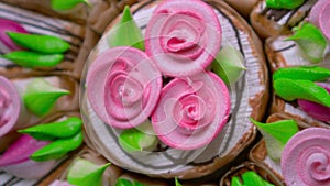 Celebratory cake with pink flowers