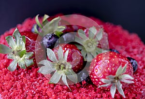 Celebratory cake with strawberry, blueberry and forest fruit.